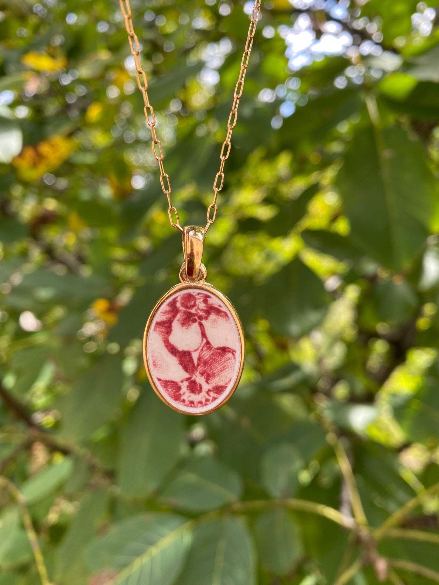 Collier vieille vaisselle "Rouge de Fer" doré